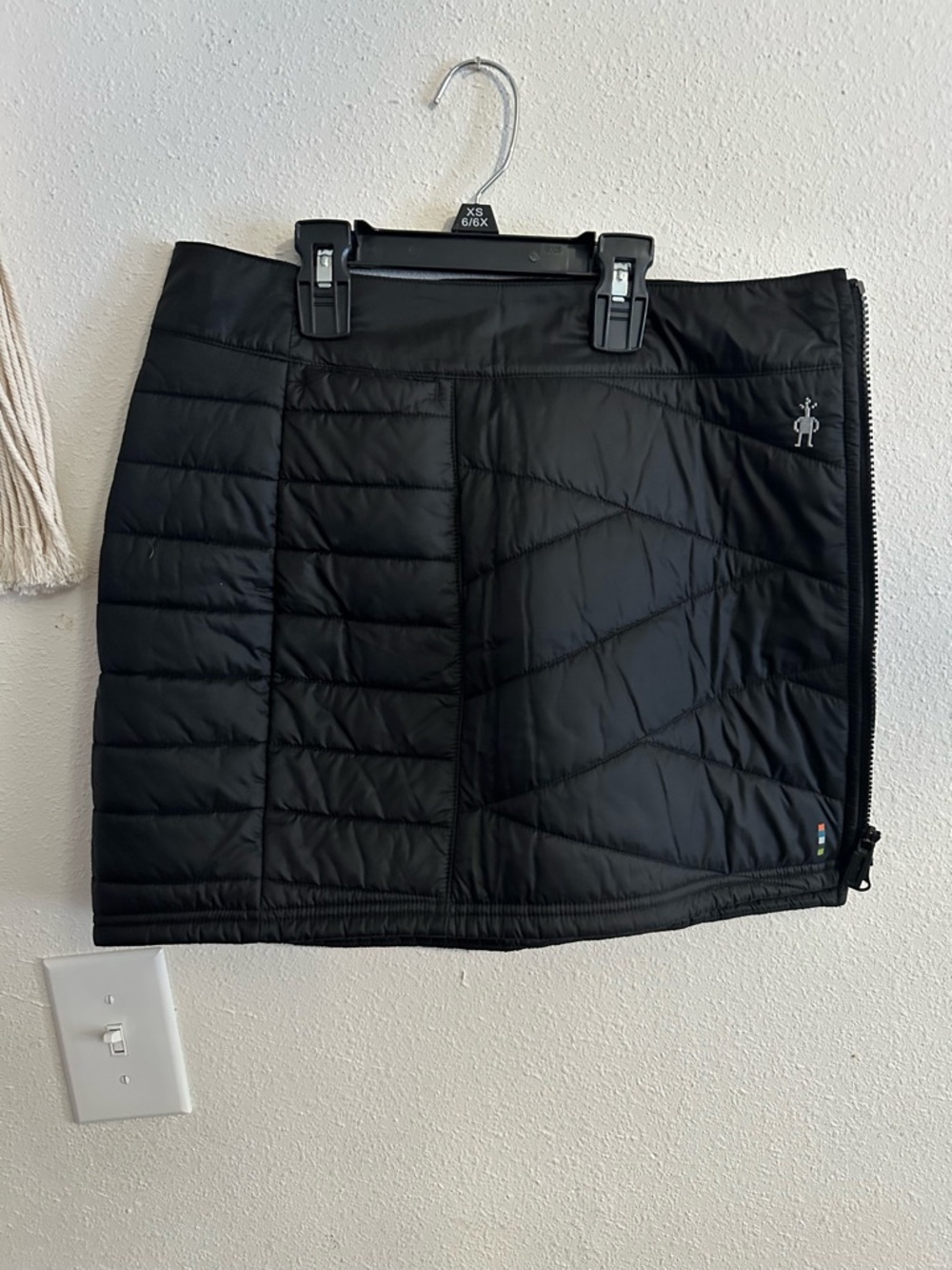 Smartwool- 

Black Quilted Performance Mini Skirt